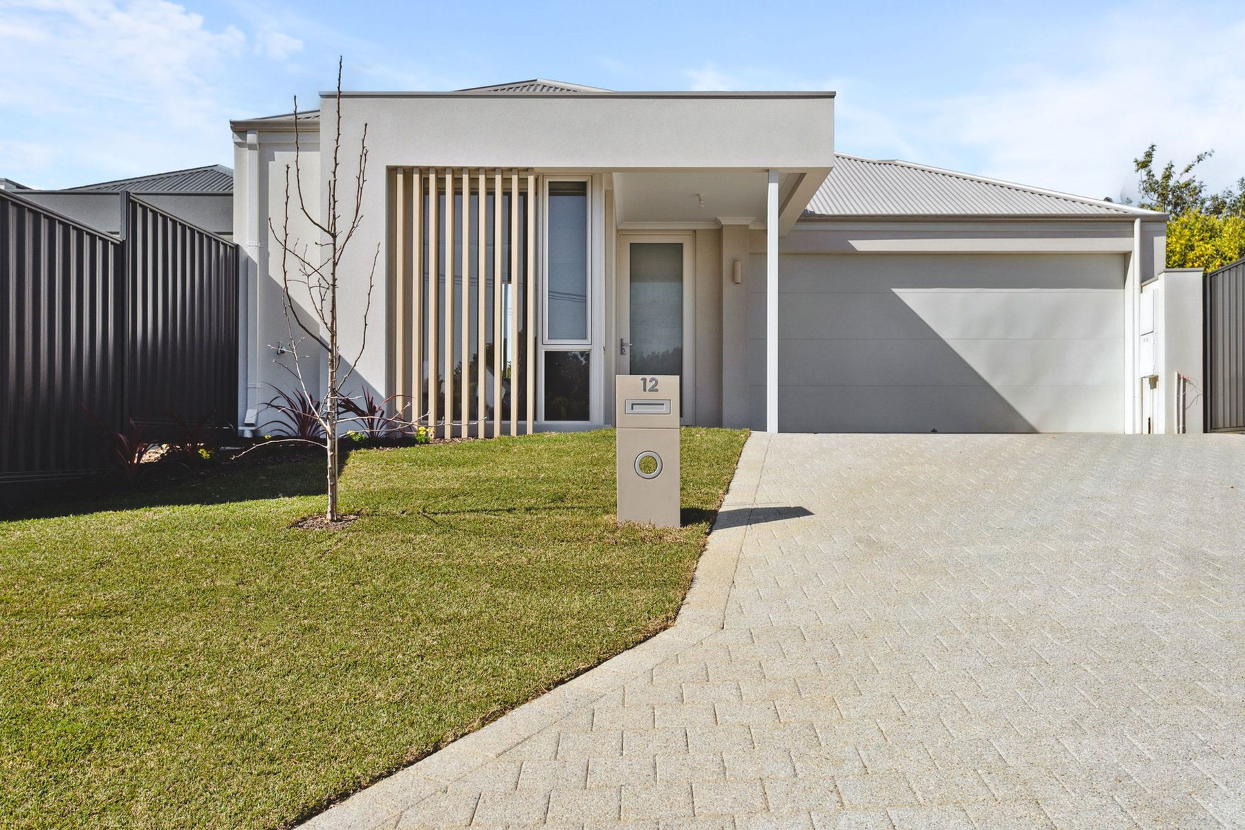The Haven display home, a light coastal facade in Padbury