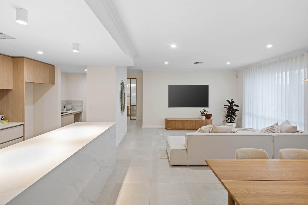The Magnolia display home: kitchen bench looking through to the living area